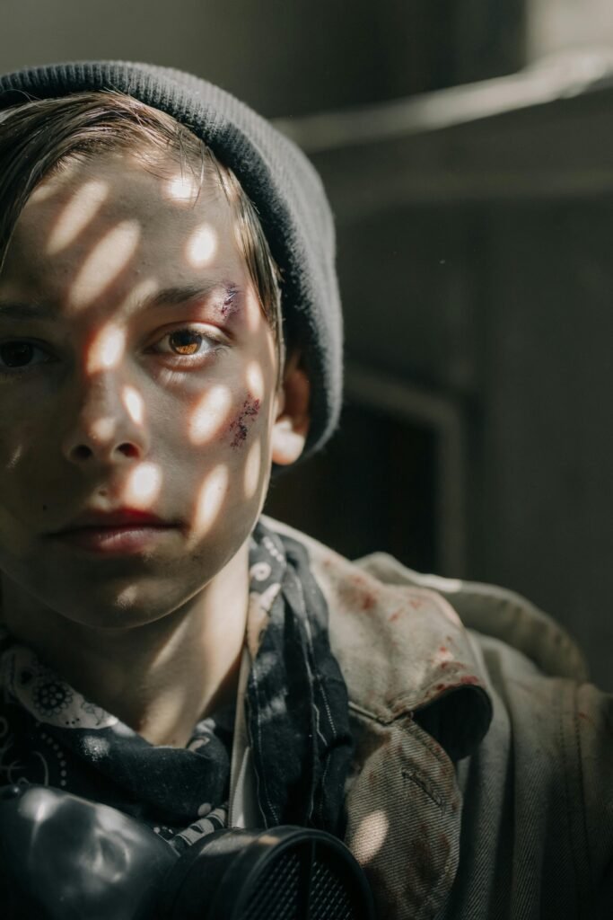 Young survivor wearing tactical clothing and face paint, representing urban prepping and survival readiness in a city environment.