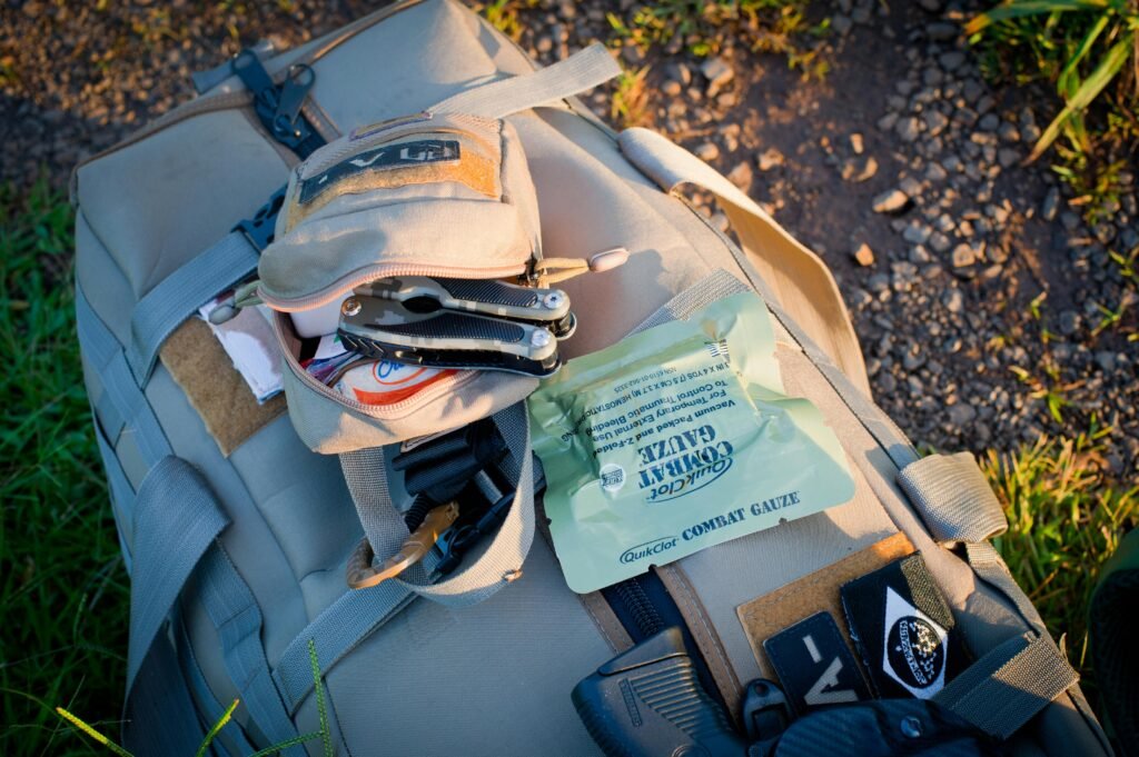 Vehicle emergency kit packed with survival gear, water, and tools ready for roadside preparedness